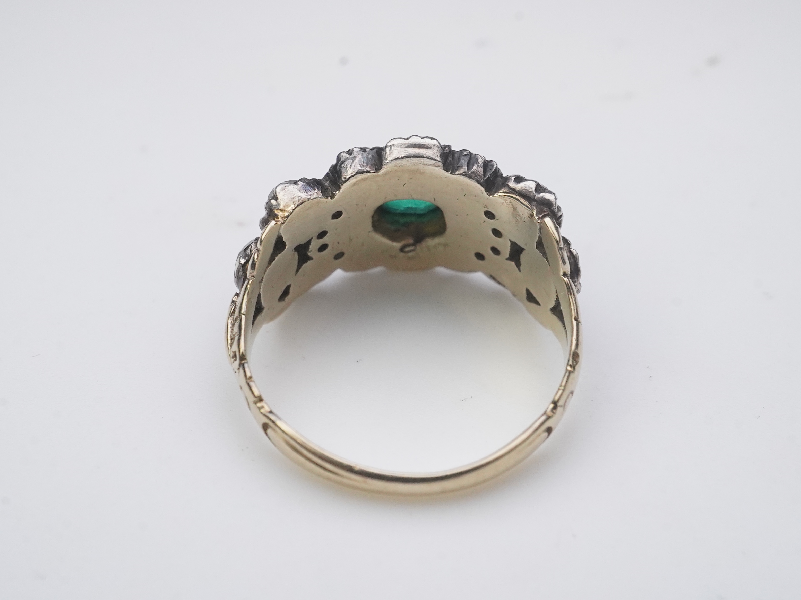 A Georgian diamond and simulant emerald ring, circa 1800